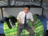 sitting-on-his-bunk